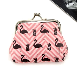 Detailed view of flamingo print coin purse with silver metal clasp on white background