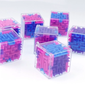 Close-up of 3D maze cubes with pink blue and purple tracks for focus training