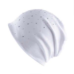 Close-up of white knitted beanie featuring shimmering silver rhinestones detail