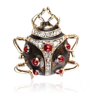 Exquisite ladybug jewelry box with gold metal, red rhinestones and insect-themed design