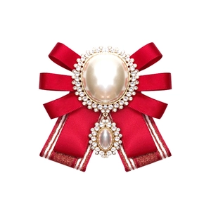Elegant red bow brooch with pearl center and rhinestone trim for women shirts