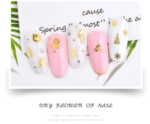 Détails de charmes de nail art de Noël avec rennes dorés et étoiles avec strass
