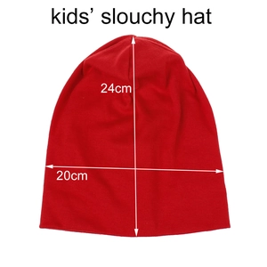 Red kids' slouchy knit hat in soft cotton blend, dimensions 24cm by 20cm