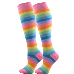 Detailed close-up of rainbow striped cotton mid-calf socks with vibrant knitted patterns