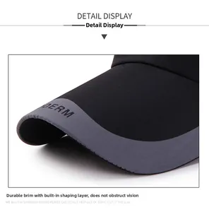 Detail of black baseball cap brim with durable sandwich layering and DERM text logo