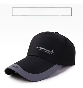 Detail of Modern British text and athlete icon on black baseball cap with grey brim trim