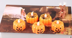Set of 5 Halloween LED pumpkin candles with Jack-o'-lantern and spider web patterns