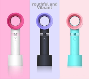 Bladeless handheld mini fan in three colors with dock for lash drying and cooling