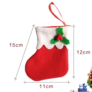 Detailed dimension guide for Christmas stocking cutlery holder made of red felt