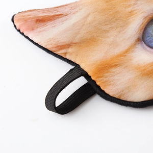 Close-up of a 3D cat face print sleep mask showing fabric texture and elastic strap