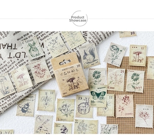Macro shot of vintage forest-themed stamp stickers with hand-drawn animal and botanical designs