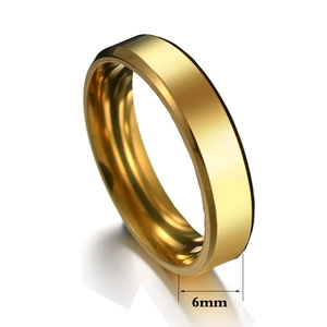 6mm wide minimalist gold stainless steel ring with a polished mirror finish surface