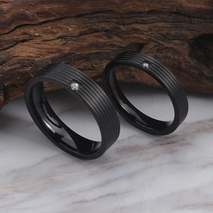 Black matte titanium steel couple rings with horizontal grooves and single zircon stones