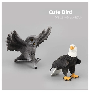 Detailed view of realistic owl and bald eagle animal models with textured feathers
