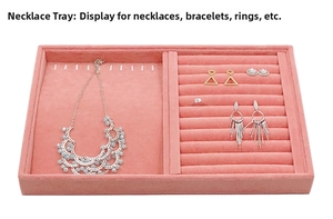 Pink velvet jewelry tray detail showing necklace hooks and ring slots storage