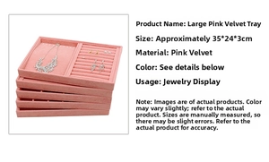 Five layers of large pink crushed velvet jewelry display trays stacked together