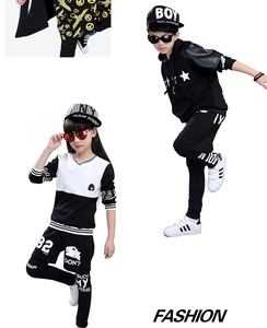 Close-up of kids hip hop streetwear outfits with hooded sweatshirts and printed pants