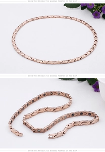 Detail of rose gold magnetic health necklace featuring polished links and secure clasp