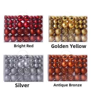 Detail of Christmas tree ornaments set showing matte, glossy and hollow spheres