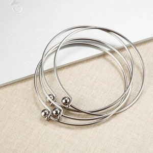 Three-piece minimalist silver stainless steel open bracelets with spherical ends for women