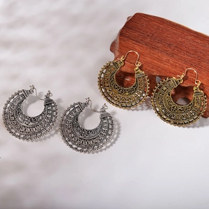 Bohemian vintage hollow carved earrings in gold and silver finish with ethnic patterns