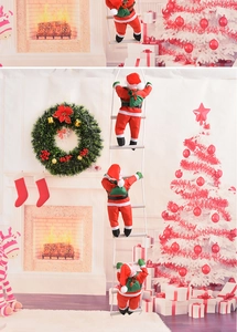 Three-segment Santa Claus climbing a white ladder against a festive indoor fireplace backdrop