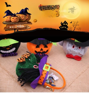Plush Halloween treat bags featuring witch, pumpkin, cat and ghost characters with candy
