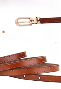 Detail view of brown split cowhide leather belt featuring a zinc alloy D-ring buckle
