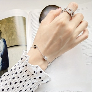 Close-up of S925 sterling silver chain ring and bracelet with sparkling zircon accents