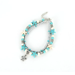 Chevillère bohème double couche avec perles turquoise, étoiles de mer et pendentif tortue