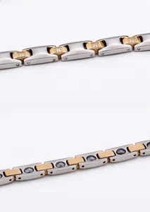 Dettagli del bracciale magnetico bicolore in acciaio con zirconi e pietre energetiche