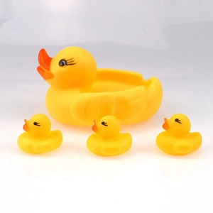 Classic yellow rubber duck family bath toy set including one large duck and three small ducklings