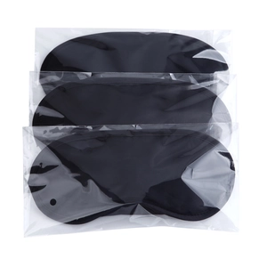 Three-piece set of breathable black sleep masks individually wrapped in clear poly bags