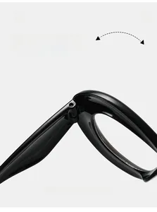 Close-up of durable metal hinge on high-gloss black oversized eyewear frames