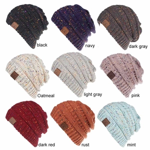 Set of 9 colorful chunky knit beanies with speckled yarn and leather C.C logo patch
