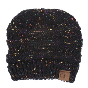 Detailed texture of thick knit beanie with colorful flecks and brown faux leather tag