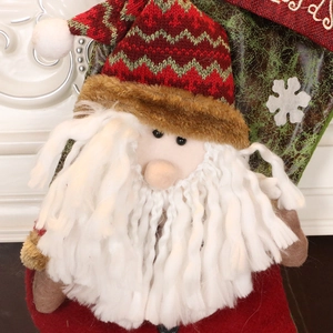 Chaussette de Noël avec motif Père Noël tricoté rouge et motifs de flocons de neige
