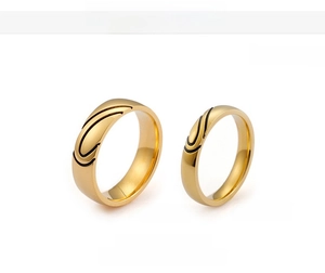 Detail of 18K gold plated couple rings showing 6mm and 4mm width measurements