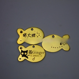 Fish-shaped personalized pet ID tags with engraved names and cute cat silhouettes