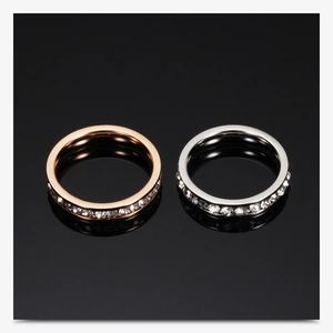 Macro detail of 4mm stainless steel rings in rose gold and silver with zircon inlays