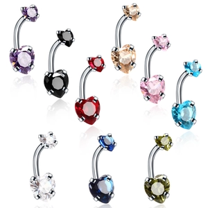 Set of 9 colorful heart-shaped cubic zirconia belly button rings on reflective white surface