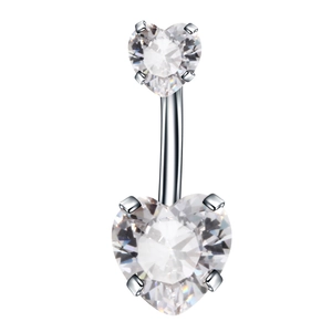 Macro detail of silver stainless steel belly ring with heart-shaped clear zircons
