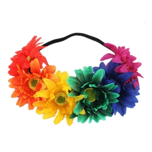 Detailed view of rainbow faux rose crown with six colorful fabric flowers on elastic headband