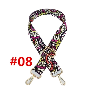 Close-up of Bohemian patterned bag strap with golden metal swivel hooks and adjuster