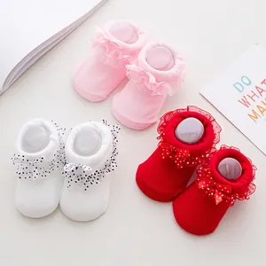 Newborn baby socks set with lace ruffles and bows in pink, red and white colors