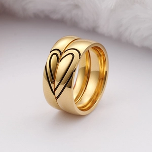 Minimalist gold heart matching rings for couples in polished titanium steel finish