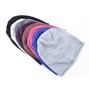 Women's rhinestone knit beanies in multiple colors including black, grey, and blue