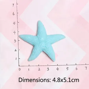 Light blue resin starfish accessory with grainy texture measured at 4.8x5.1cm size