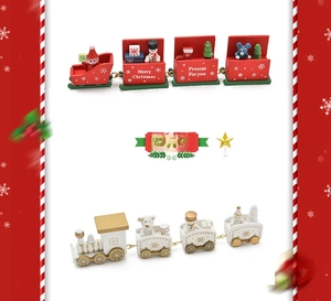 Macro shot of red, green, and white wooden Christmas train ornaments with festive patterns