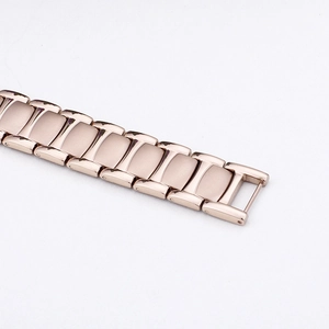 Bracelet de magnétothérapie en acier or rose élégant avec finitions mates et polies